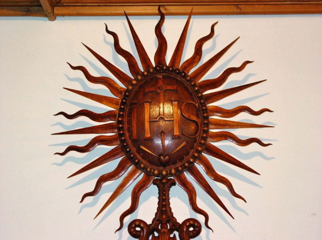 Sculpture en bois, restauration d'art, feuille d'or, dorures, porte collège saint michel fribourg